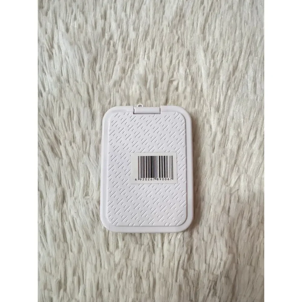 Hello Kitty pink & white striped compact mirror holding a teddy bear sparkly